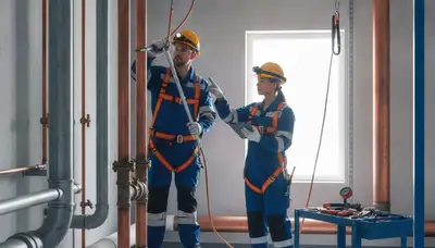 Loveland, CO plumber repairing a residential pipe leak for fast home plumbing service